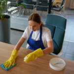 professional cleaning service person cleaning office