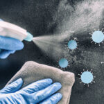 disinfectant spray on surface to sanitize against viruses