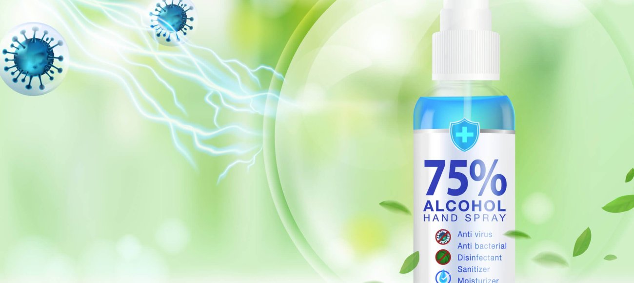 A hand disinfectant spray with icons for antivirus, antibacterial properties, and 99.9% germ-killing effectiveness, set against a fresh green backdrop with repelled virus illustrations.
