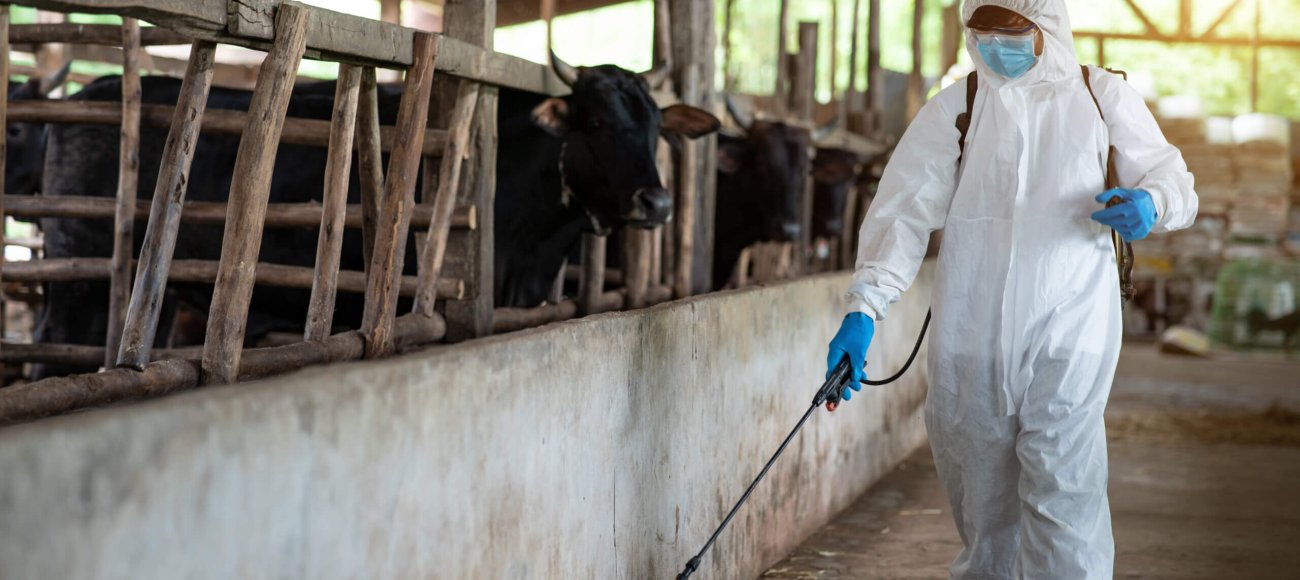 Male,Ppe,Protective,Clothing,,Spraying,Disinfectants,And,Viruses,In,A