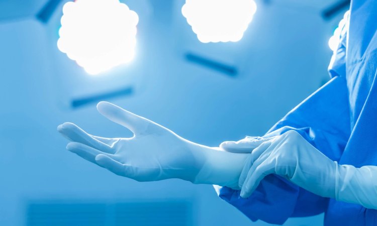 Blue,Tone,Photo,Of,Doctor,In,Surgical,Gown,Suit,Inside