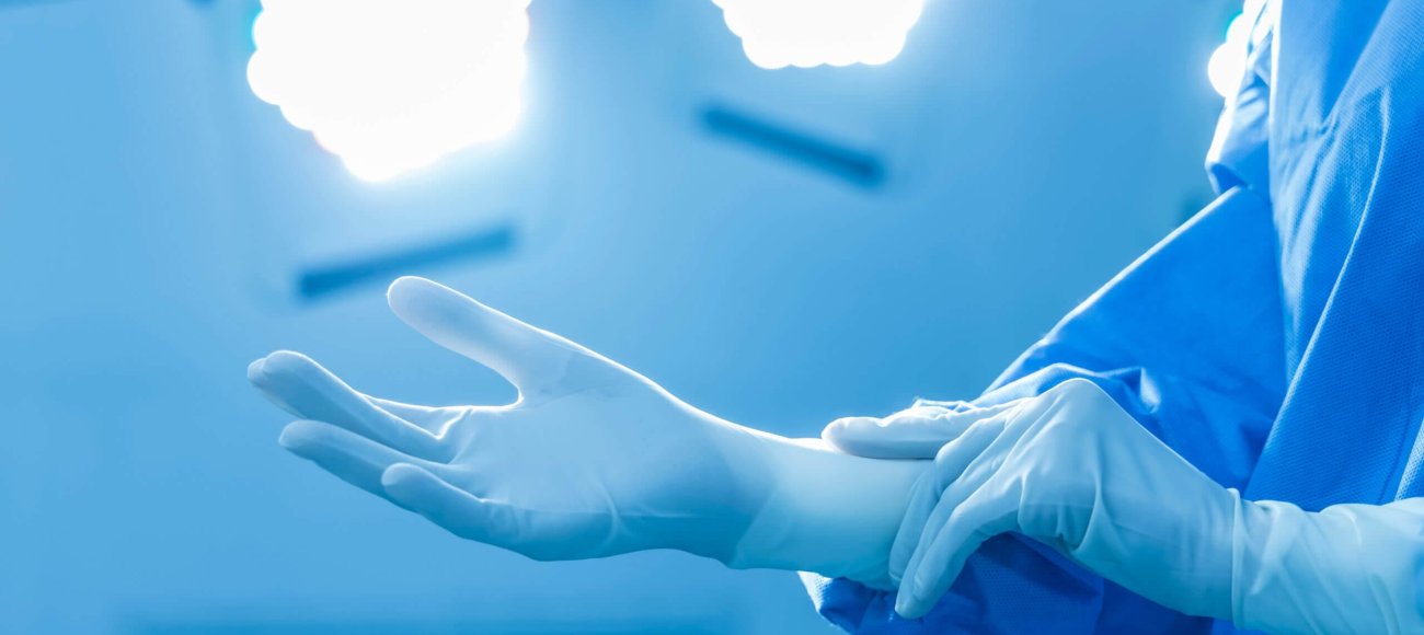 Blue,Tone,Photo,Of,Doctor,In,Surgical,Gown,Suit,Inside