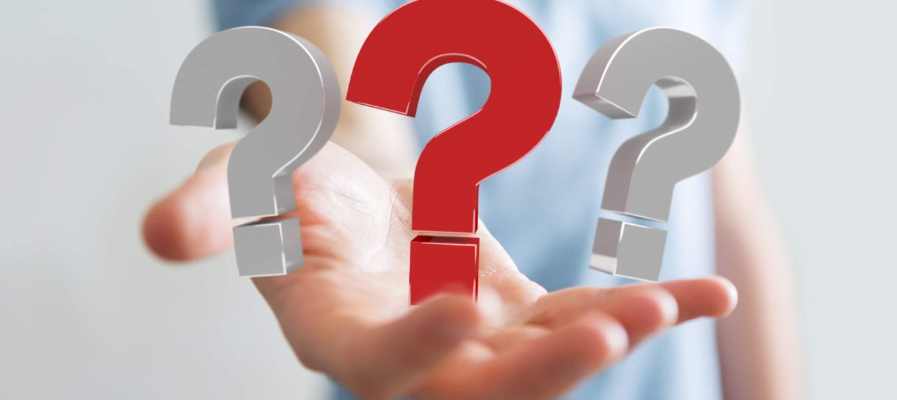 3D question mark in hand